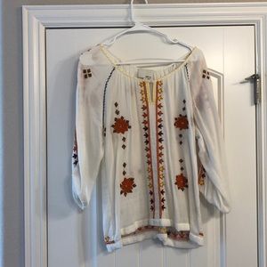 Embroidered and beaded tunic style shirt